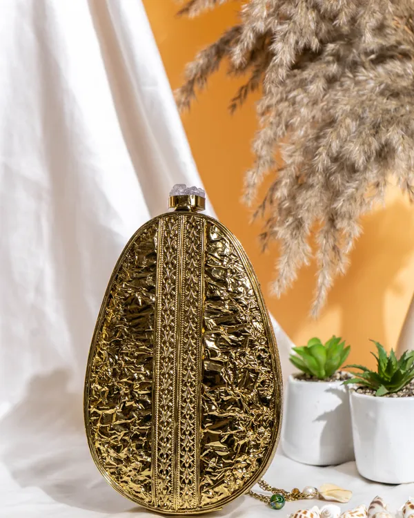 Solene_Mirage_MOP_Clutch_–_Sculptural_Mother_of_Pearl_Purse